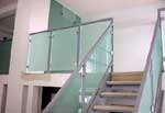 Sandblasted Glass Staircase with Metal Railing